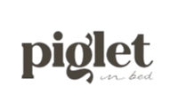 logo-Piglet in bed